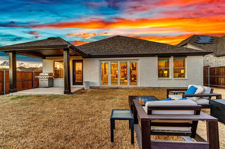 Exterior details and patio area of a home in Woodstone, Providence Village (Image 2). Exterior details and patio area of a home in Woodstone, Providence Village (Image 2).