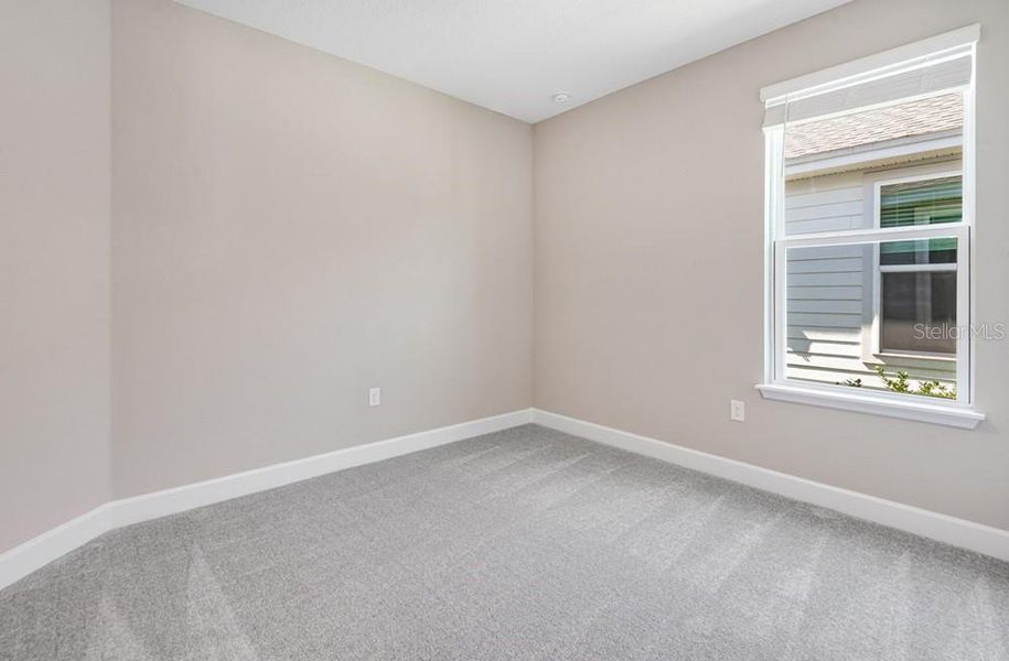 Spacious, unfurnished interior of a new home in Colbert Landings, Palm Coast (Image 20).