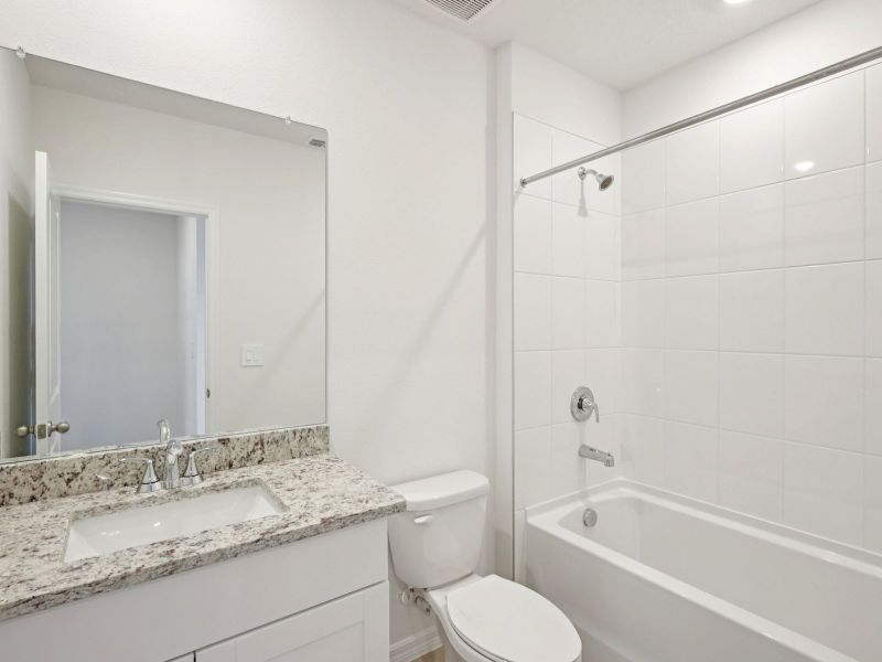 Furnished interior view inside a new home in Salt Meadows - Premier Series, Parrish (Image 7).