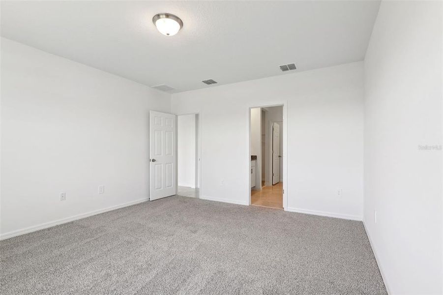 Spacious, unfurnished interior of a new home in Deer Run at Crosswinds, Davenport (Image 30).