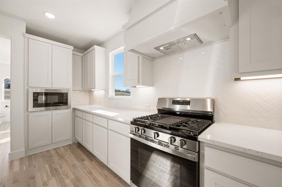 Furnished interior view inside a new home in The Resort on Eagle Mt. Lake, Fort Worth (Image 9).