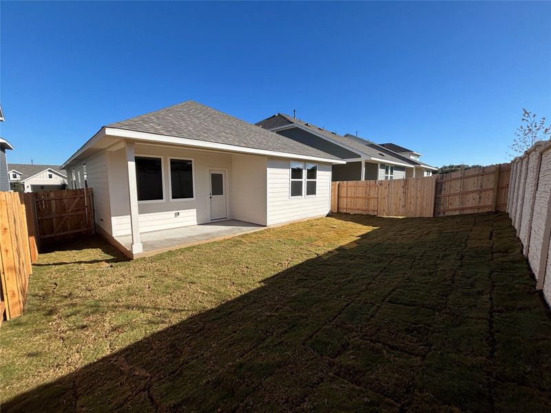 Exterior details and patio area of a home in Cannon Ranch 40s, Dripping Springs (Image 21).