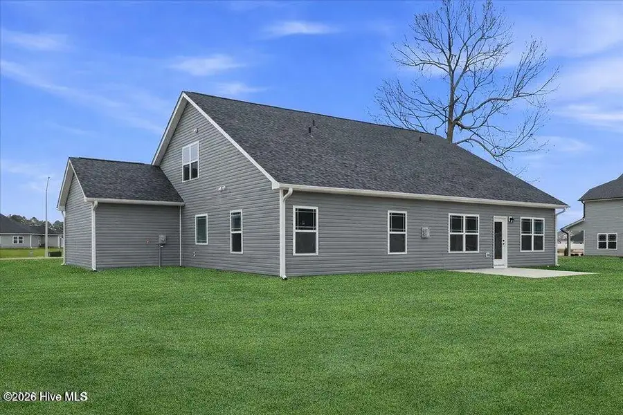 Exterior details and patio area of a home in Wood Creek Landing, Leland (Image 3).