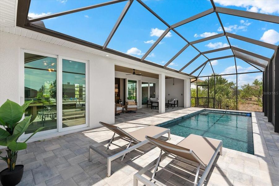 Exterior details and patio area of a home in , Port Charlotte (Image 24).