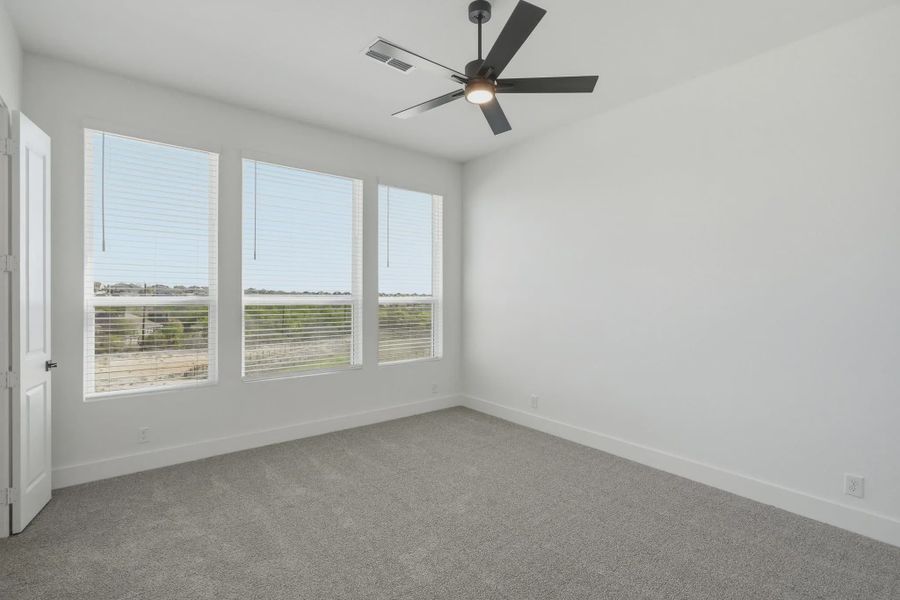 Representative unfurnished interior of a home built from the Calypso by Chesmar Homes in Prominence Urban, San Antonio (Image 16).