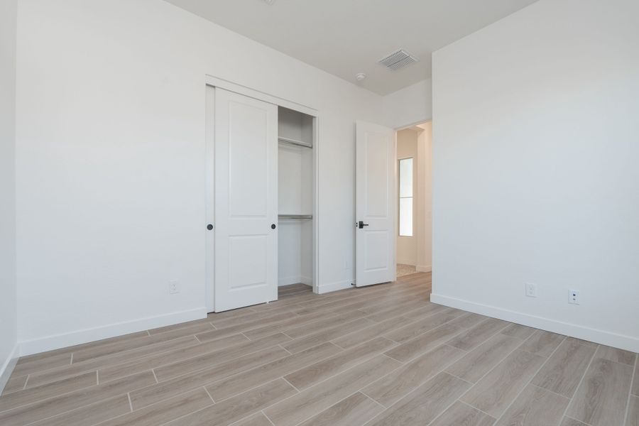 Spacious, unfurnished interior of a new home in Waterston Central, Gilbert (Image 13).