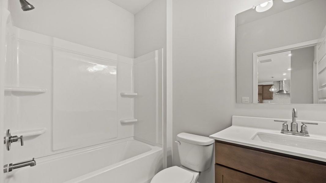 Representative furnished interior of a home built from the Summit by D.R. Horton in Heritage Pointe, Senoia (Image 9).