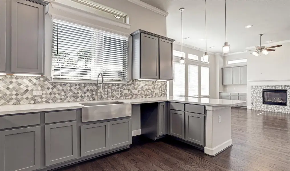 Kitchen open to the great room (*Photo not of actual home and used for illustration purposes only.) Kitchen open to the great room (*Photo not of actual home and used for illustration purposes only.)