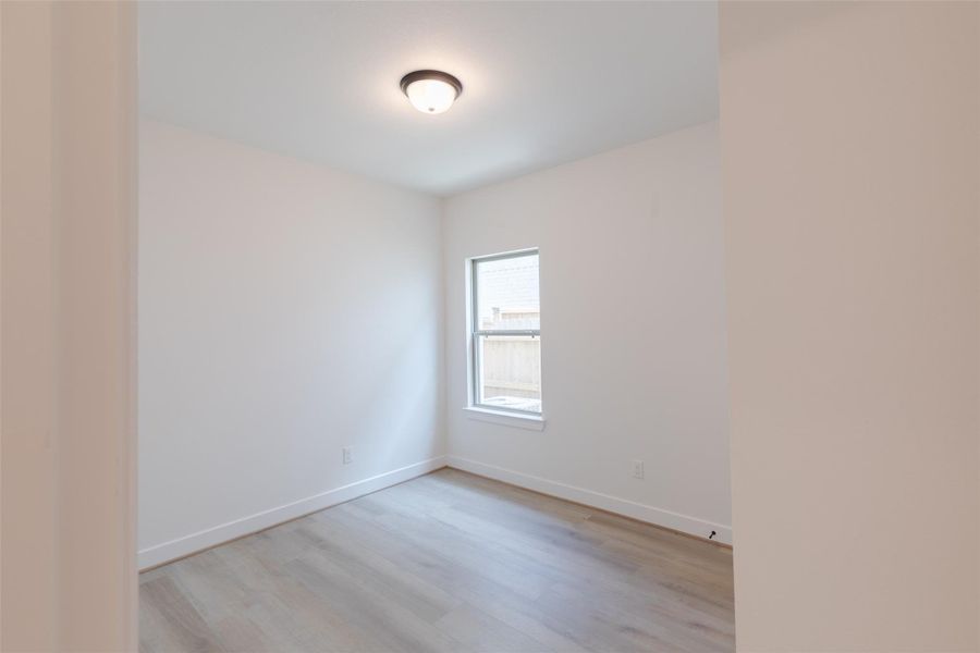 Downstairs room ideal for an office or guest suite