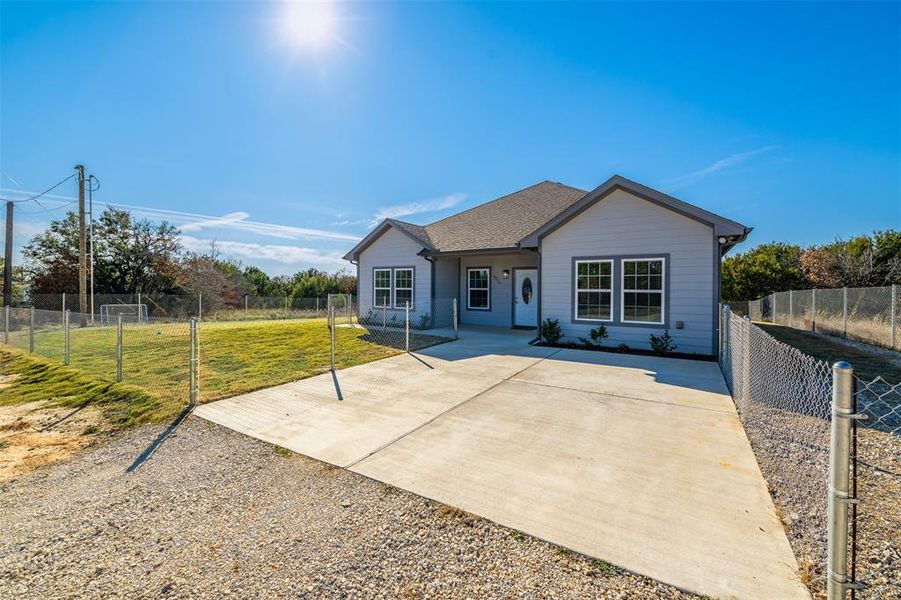 View of front of home featuring a front lawn