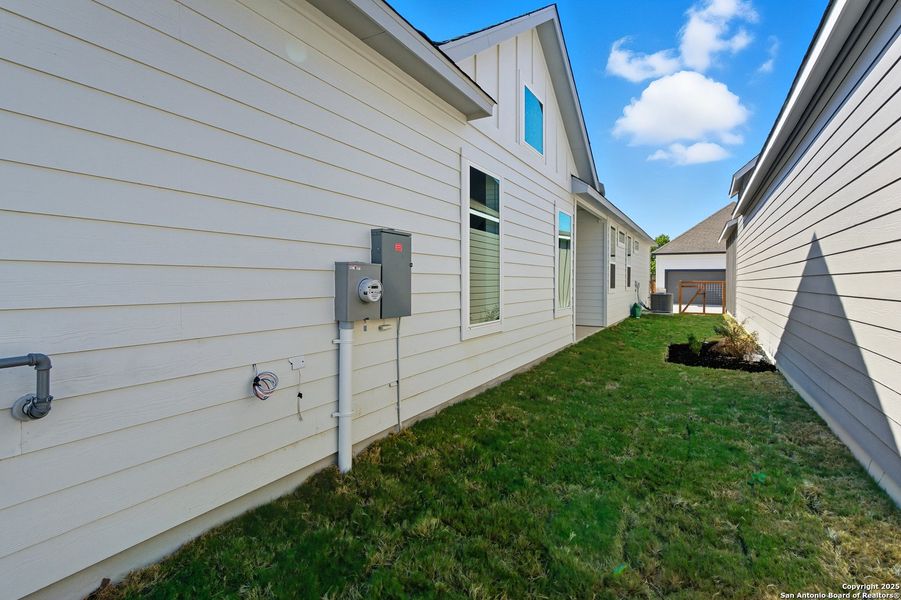 Exterior details and patio area of a home in The Crossvine – Garden Homes, Schertz (Image 2).
