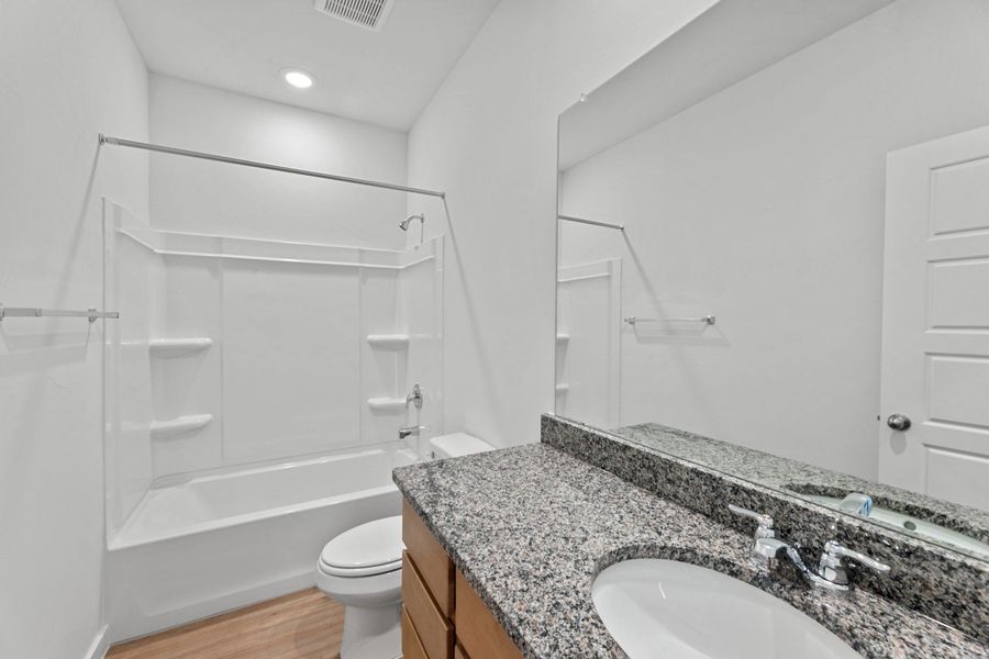 Representative furnished interior of a home built from the Sabrine by Hakes Brothers in Highland Ridge, New Braunfels (Image 17).