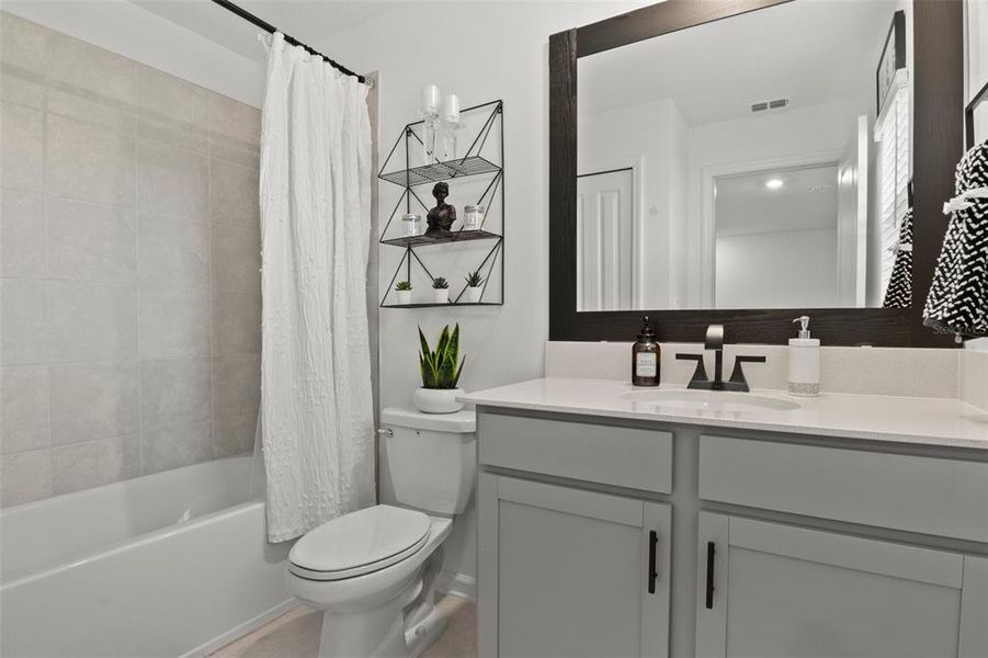 Furnished interior view inside a new home in Tohoqua, Kissimmee (Image 26).