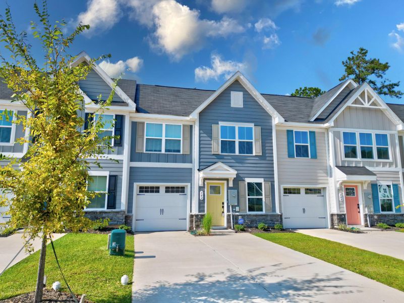 Front exterior of a new home in , Santee, SC, highlighting curb appeal (Image 1).