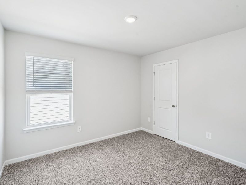 Spacious, unfurnished interior of a new home in Hawthorne Station, College Park (Image 19).