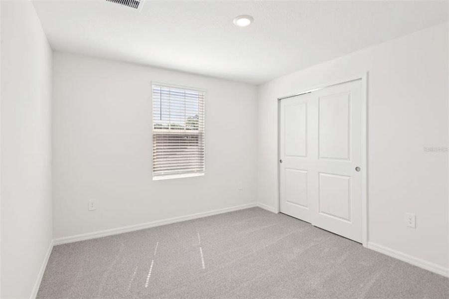 Spacious, unfurnished interior of a new home in Hilltop Vistas, Dade City (Image 24).