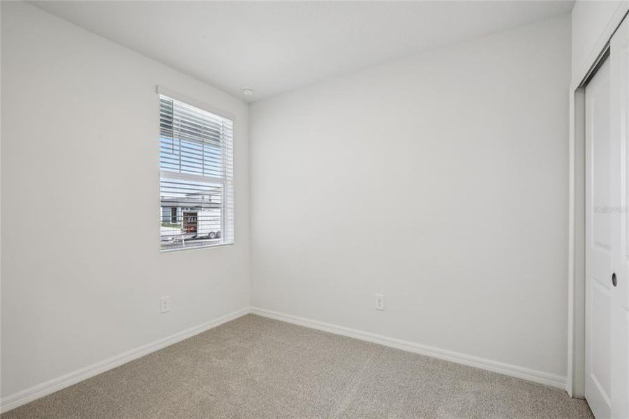 Spacious, unfurnished interior of a new home in Salt Meadows - Premier Series, Parrish (Image 13).