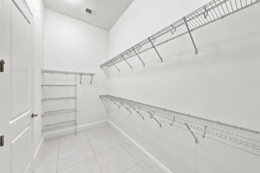 Primary walk-in Closet Primary walk-in Closet
