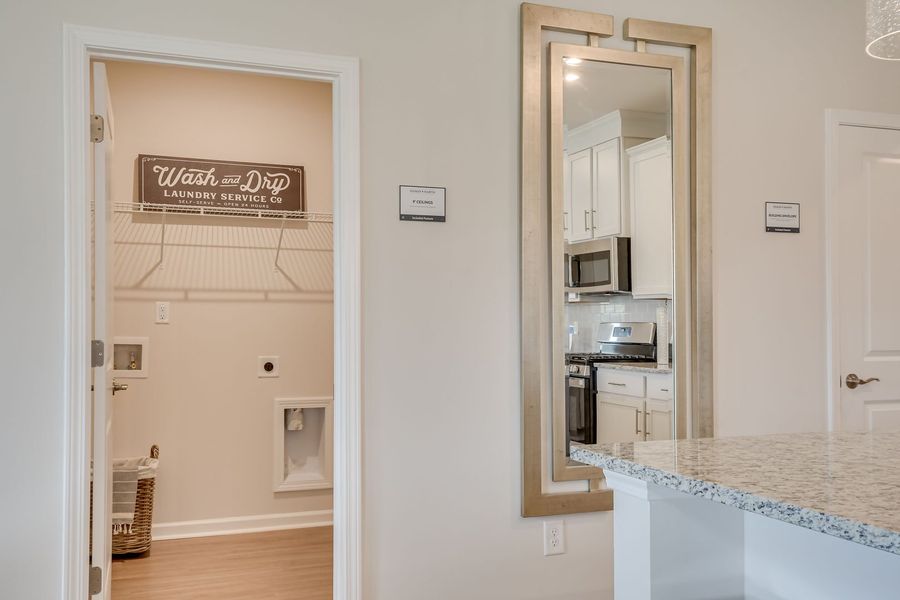Furnished interior view inside a new home in The Beacon at Old Peachtree Single Family Homes, Lawrenceville (Image 156).