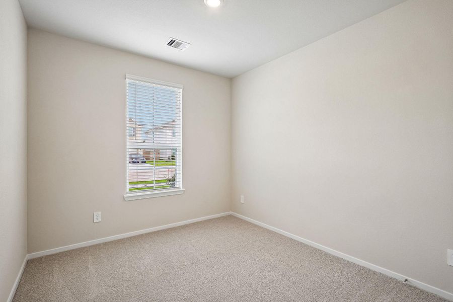 Spacious, unfurnished interior of a new home in Riviera Pines - Premier Series, Huffman (Image 22).