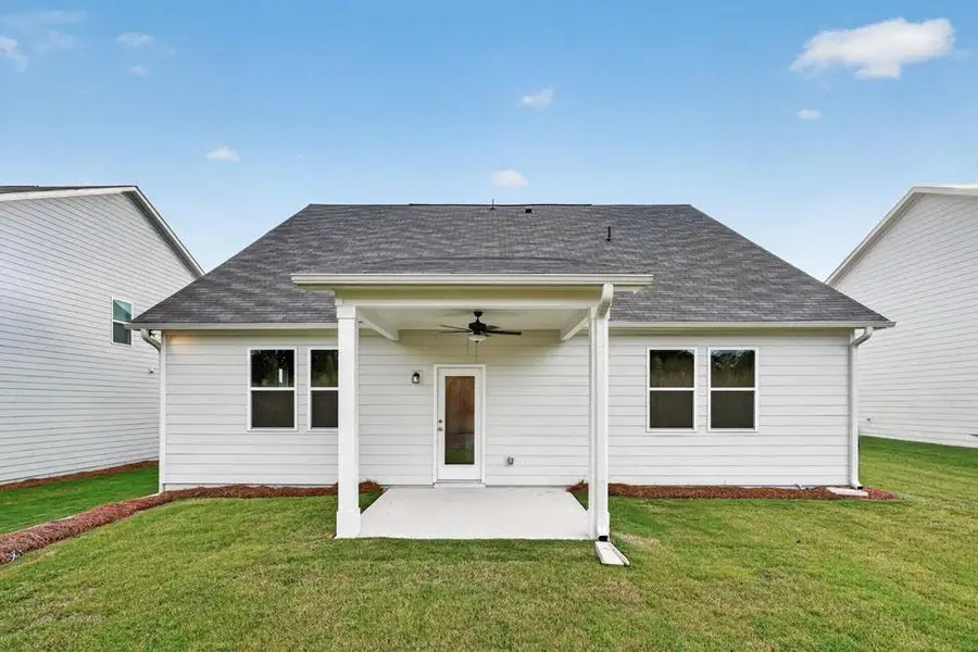 Exterior details and patio area of a home in Weatherfield, Buford (Image 21).