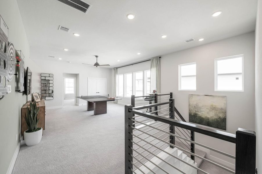 Furnished interior view inside a new home in Bridgeland, Cypress (Image 16).