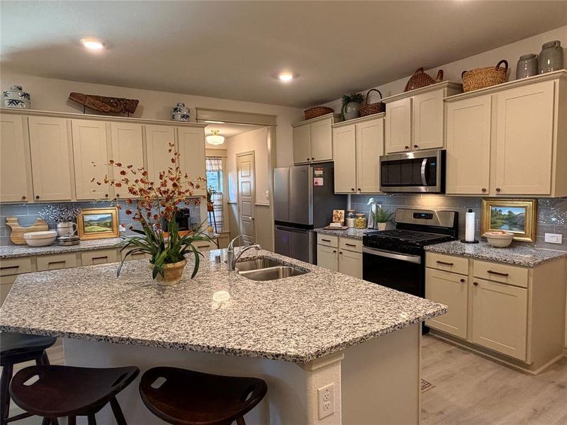 Repainted Cabinets and Added Hardware. Repainted Cabinets and Added Hardware.