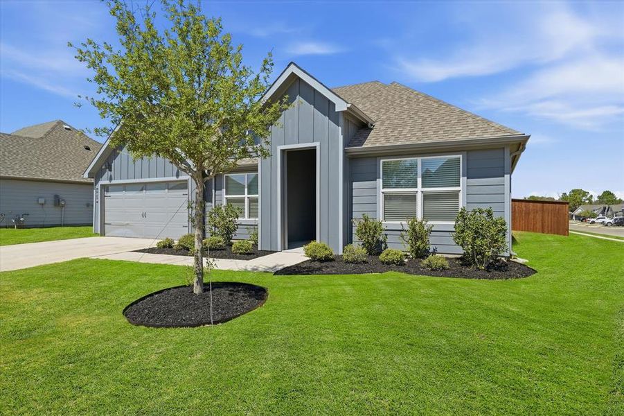Front exterior of a new home in Sandstone Estates, Granbury, TX, highlighting curb appeal (Image 24).
