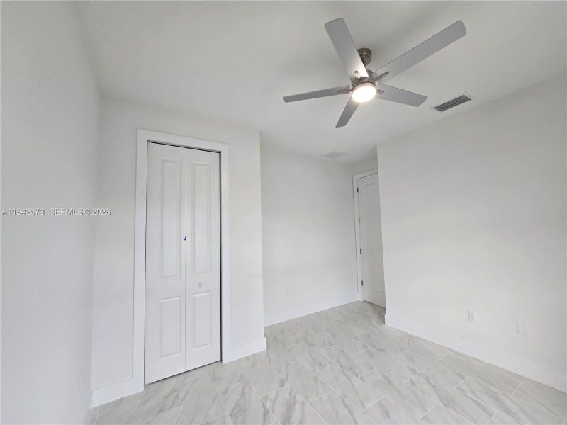 Spacious, unfurnished interior of a new home in , Lehigh Acres (Image 13).