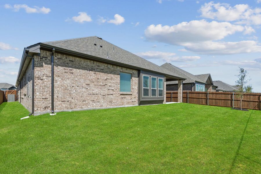 Exterior details and patio area of a home in Westside Preserve, Midlothian (Image 4).