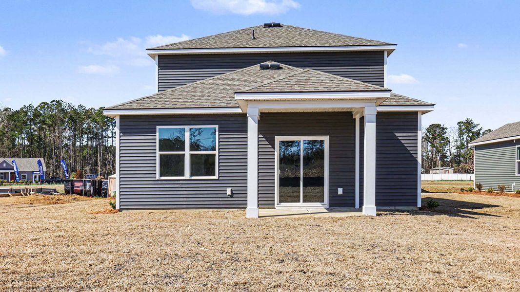 Exterior details and patio area of a home in Winfield Farms, Myrtle Beach (Image 3).