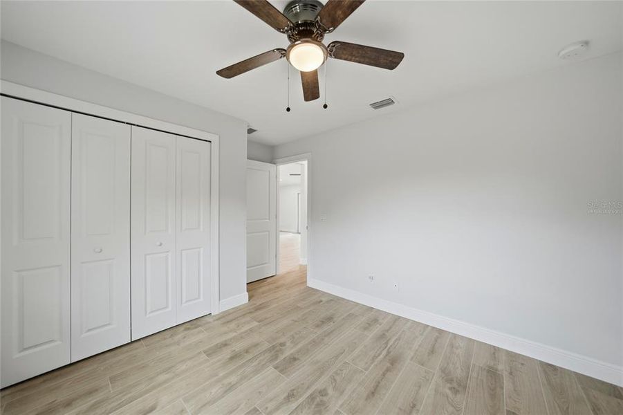 Spacious, unfurnished interior of a new home in , Port Charlotte (Image 28).