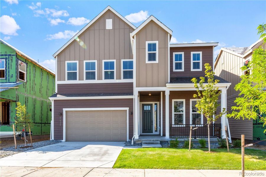 Front exterior of a new home in Dillon Pointe - Journey, Westminster, CO, highlighting curb appeal (Image 19).