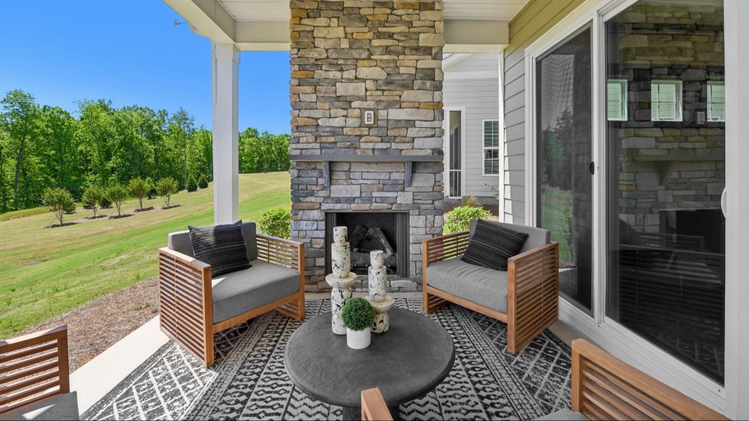 The Enthusiast Plan by DRB Homes Elevate in Brook Run, Fort Mill SC - Rear Porch The Enthusiast Plan by DRB Homes Elevate in Brook Run, Fort Mill SC - Rear Porch