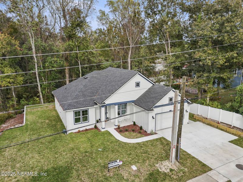 Front exterior of a new home in , Jacksonville, FL, highlighting curb appeal (Image 32).