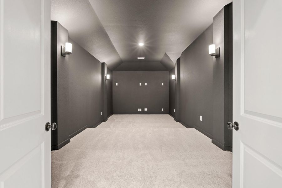 *REPRESENTATIONAL PHOTO* Spacious Media With a Stadium Riser & Dark Paint *REPRESENTATIONAL PHOTO* Spacious Media With a Stadium Riser & Dark Paint