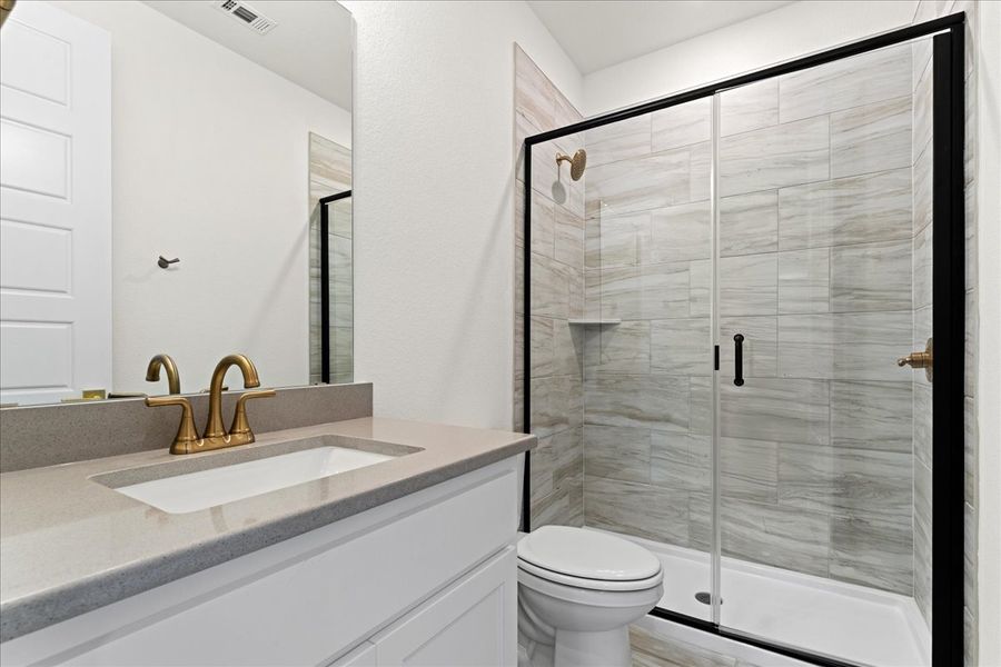 Representative furnished interior of a home built from the The Braden II by Doug Parr Custom Homes in Kessler Farms, Brock (Image 40).