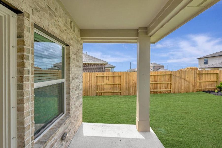 Back patio and large yard. Back patio and large yard.