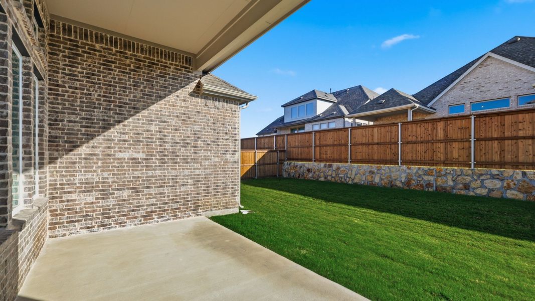 Exterior details and patio area of a home in Rio Vista at Kelly Ranch, Aledo (Image 4).