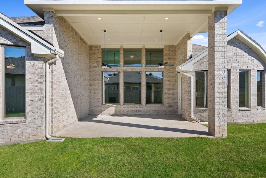 Exterior details and patio area of a home in , Conroe (Image 22).
