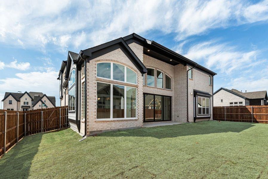Front exterior of a new home in Cedar Ridge Estates, Grand Prairie, TX, highlighting curb appeal (Image 20). Front exterior of a new home in Cedar Ridge Estates, Grand Prairie, TX, highlighting curb appeal (Image 20).