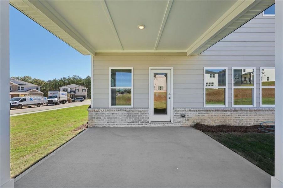 Exterior details and patio area of a home in Parkside at Grayson, Grayson (Image 24).