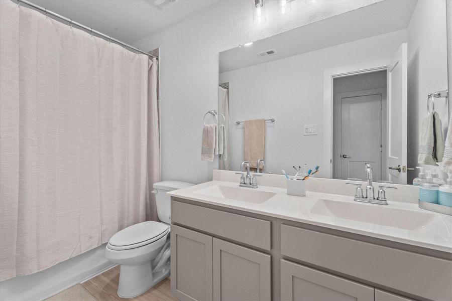 Furnished interior view inside a new home in Sorella, Tomball (Image 41).