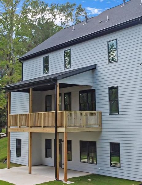Front exterior of a new home in , Conyers, GA, highlighting curb appeal (Image 14).