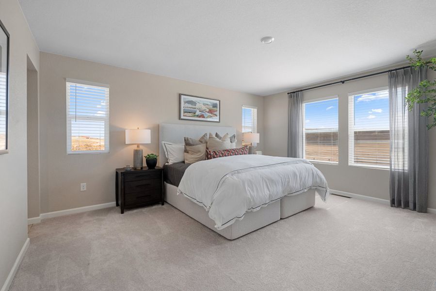 Representative furnished interior of a home built from the 4005 by Risewell Homes in Harvest Crossing, Aurora (Image 8).