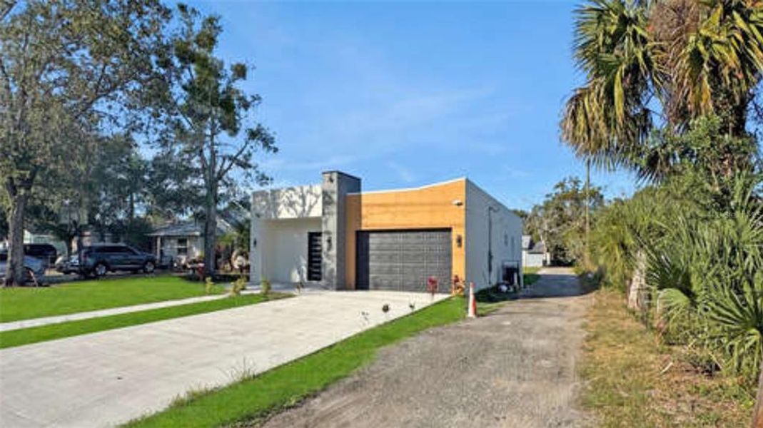 Front exterior of a new home in , Apopka, FL, highlighting curb appeal (Image 19). Front exterior of a new home in , Apopka, FL, highlighting curb appeal (Image 19).