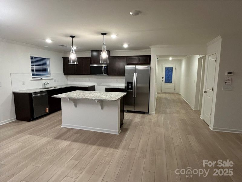 Kitchen and foyer Kitchen and foyer
