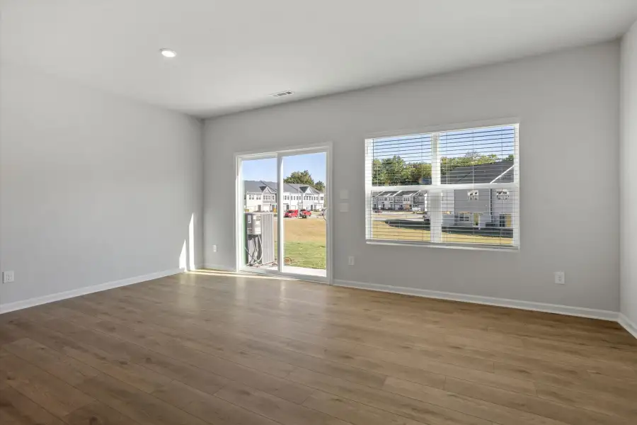Spacious, unfurnished interior of a new home in West Main Townhomes, Sanford (Image 16).