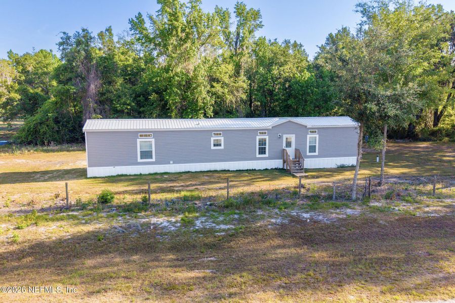 Exterior details and patio area of a home in , Gainesville (Image 16).