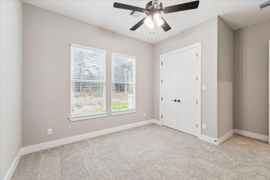 THE PICTURE SHOWN IS NOT THE ACTUAL HOME. TRINITY SIGNATURE HOMES IS BUILDING A SIMILAR FLOOR PLAN.